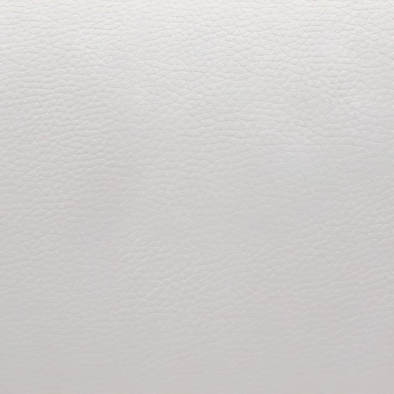 Detalle de tapizado acolchado en tela blanca con textura de costura diagonal