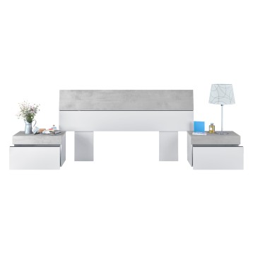 Cama con cabecero bicolor gris y blanco con mesitas de noche a juego en ambiente decorado
