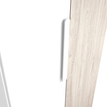 Puerta de madera clara con marco blanco y tirador metálico minimalista integrado en el canto