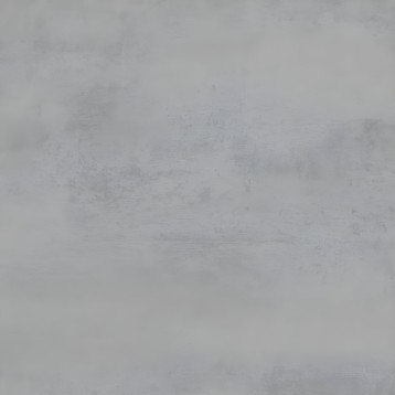 Detalle de superficie de hormigón pulido gris claro con textura desgastada y acabado mate