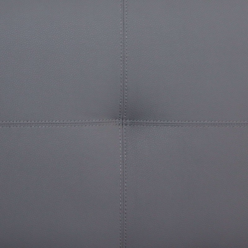 Detalle de tapizado gris con costuras decorativas formando cuadrícula geométrica