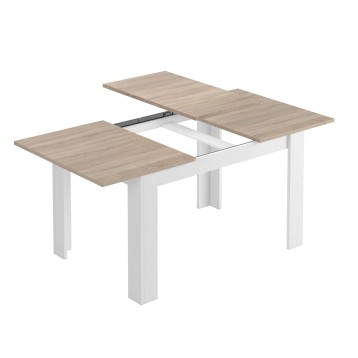 Mesa de comedor extensible con tablero en madera clara y patas blancas. Sistema de apertura para ampliar la superficie