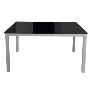 Mesa de comedor rectangular con cubierta negra y estructura de patas grises