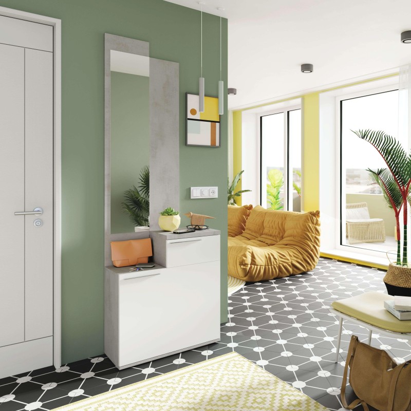 Recibidor blanco con espejo marco gris y cajones en ambiente interior con pared verde y puerta blanca