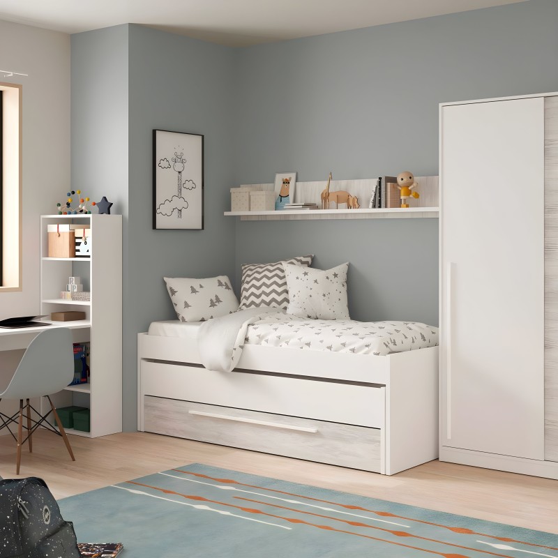 Cama infantil blanca con cajones de almacenamiento y cabecero acolchado en ambiente de dormitorio