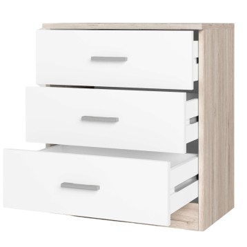 Cómoda de madera clara y blanca con tres cajones abiertos y tiradores metálicos grises