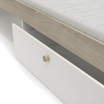 Detalle de cajón abierto en mueble con frente blanco y tirador de madera natural