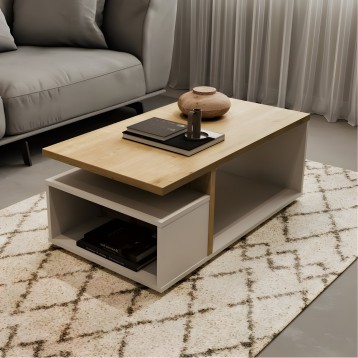Mesa de centro rectangular con tablero de madera clara y base blanca con compartimento abierto en ambiente de sala