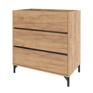 Mueble de baño de madera clara con tres cajones y tiradores negros sobre patas metálicas