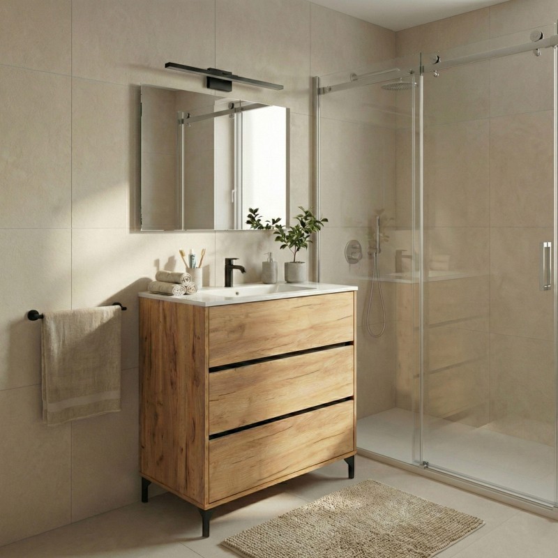 Mueble de baño con madera natural y tres cajones negros en ambiente de baño moderno