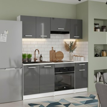 Cocina integral gris antracita y blanco con muebles superiores e inferiores y encimera negra en ambiente de vivienda