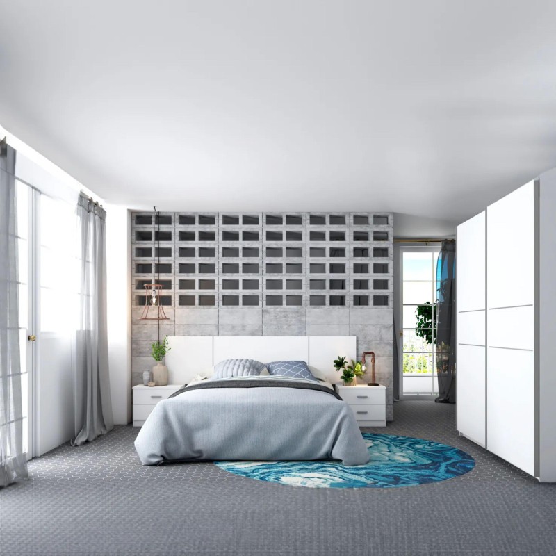 Dormitorio moderno con cama blanca y cabecero tapizado en ambiente completo con muebles a juego y pared de almacenamiento