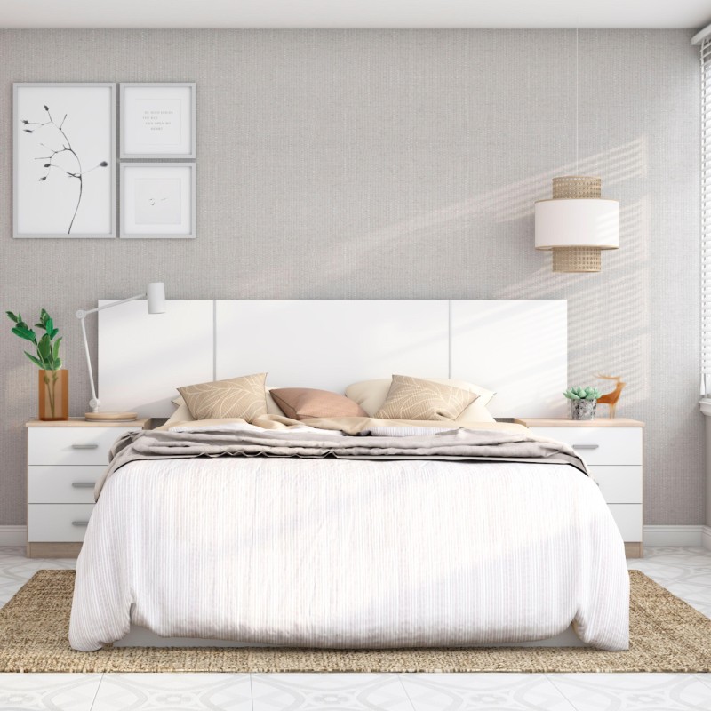 Cama con cabecero acolchado blanco y mesitas laterales en ambiente de dormitorio minimalista