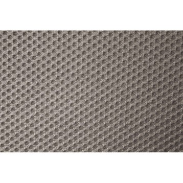 Detalle de tapizado beige con textura de punto y relieve tridimensional