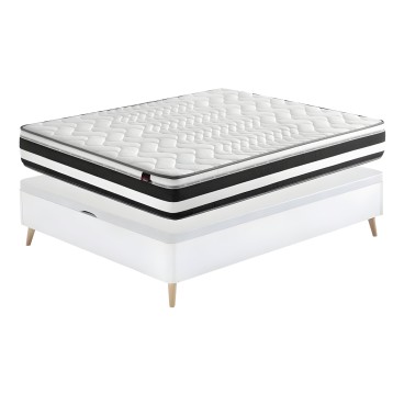 Cama blanca con colchón acolchado blanco y negro y patas de madera natural en vista general